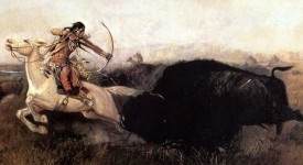 Indiani a caccia di bisonti con arco e frecce