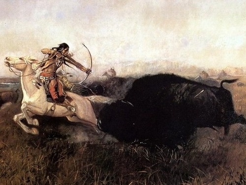 Indiani a caccia di bisonti con arco e frecce