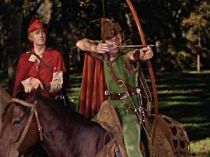 Robin Hood di Errol Flynn tira con un arco Long Bow